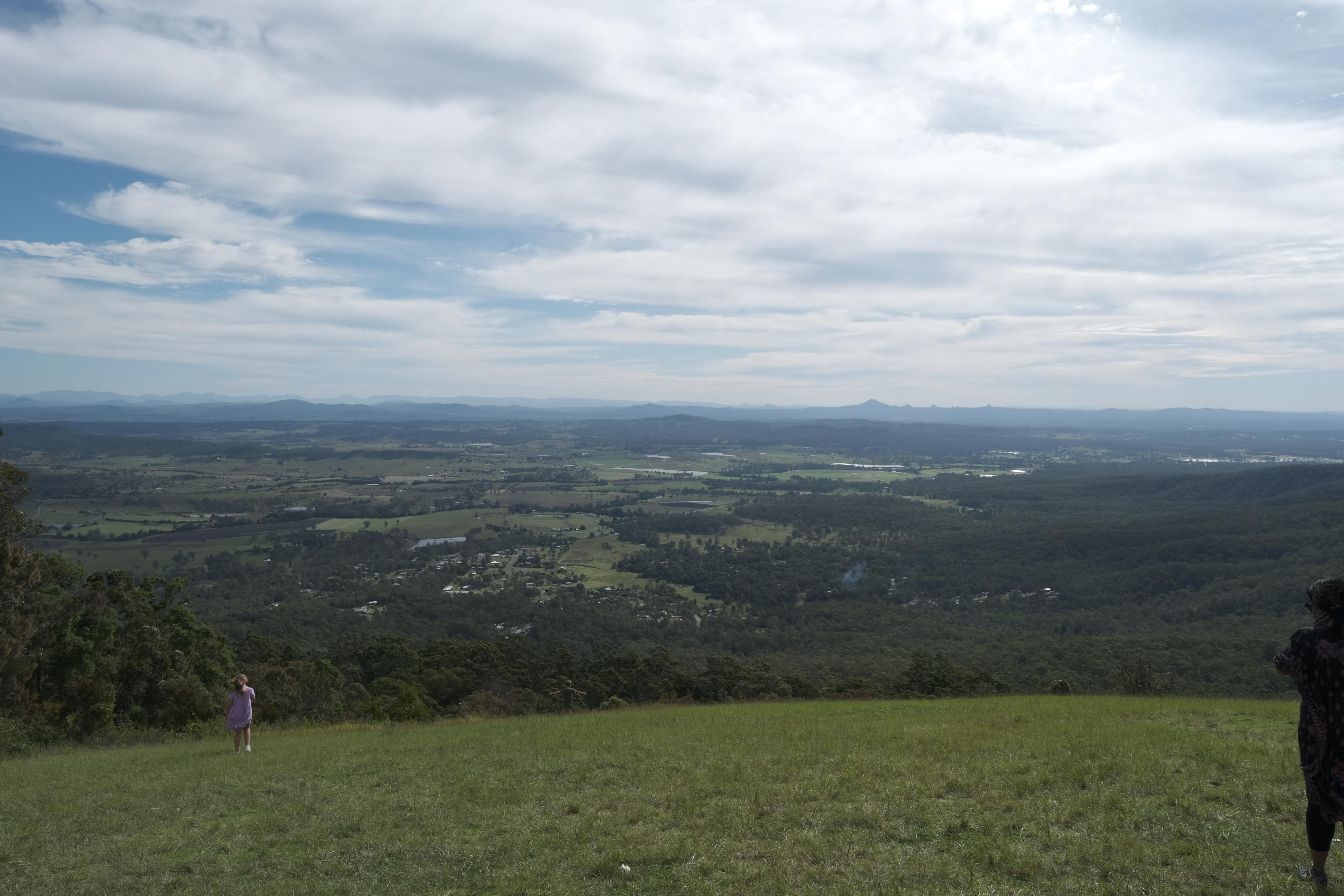 image of countryside landscape sprawled beneath hill