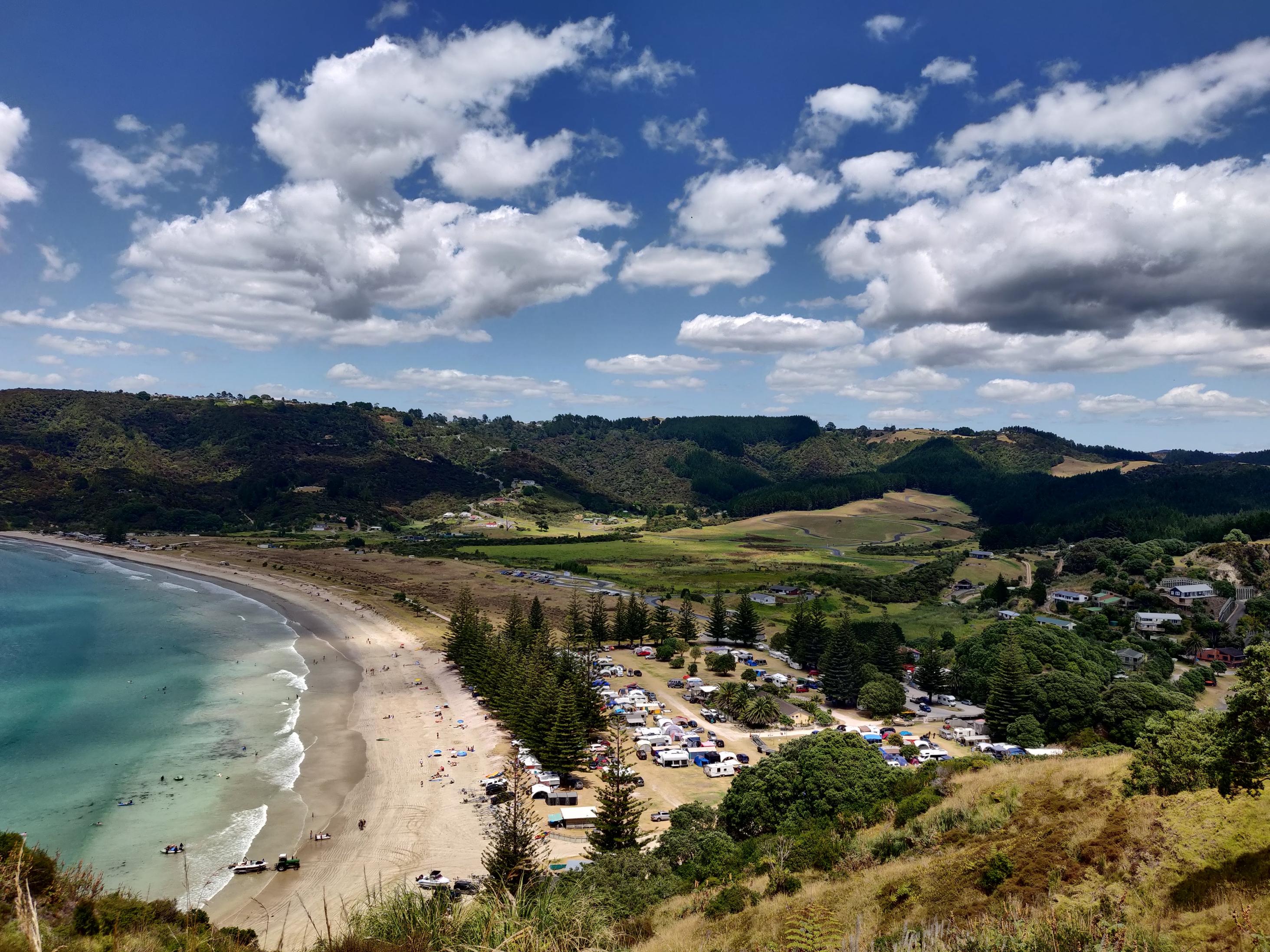 image of campground sprawled next to a prsitine beach